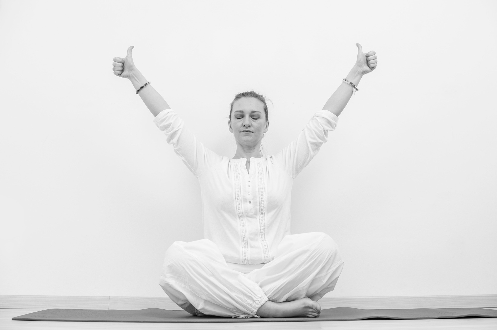 Young Woman Practicing Kundalini Yoga Asana